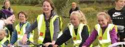 children on a group cycle
