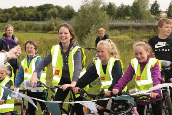 children on a group cycle